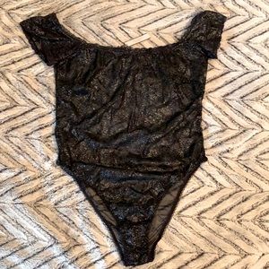 NWT Victoria Secret Body Suit. Size Large